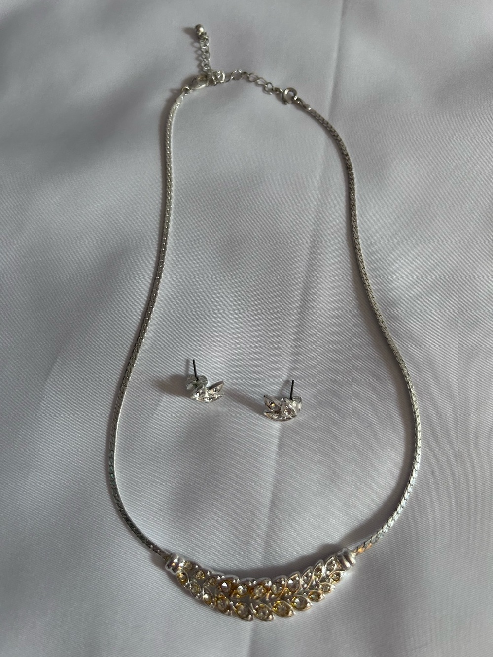 Silver-tone Necklace With A Crescent Shaped Center Piece And Stud Earrings